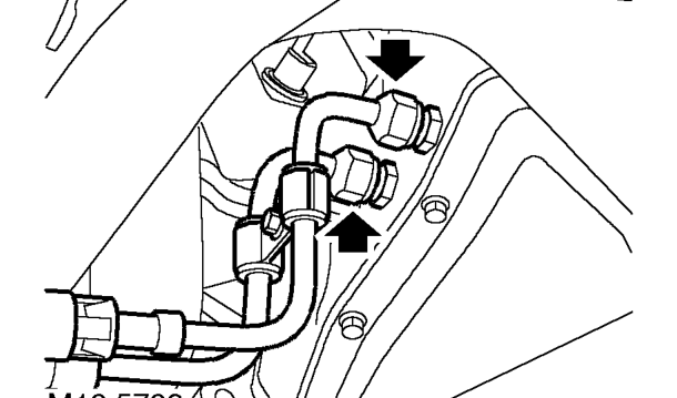 Remove nuts and bolts securing dampers to upper arms.