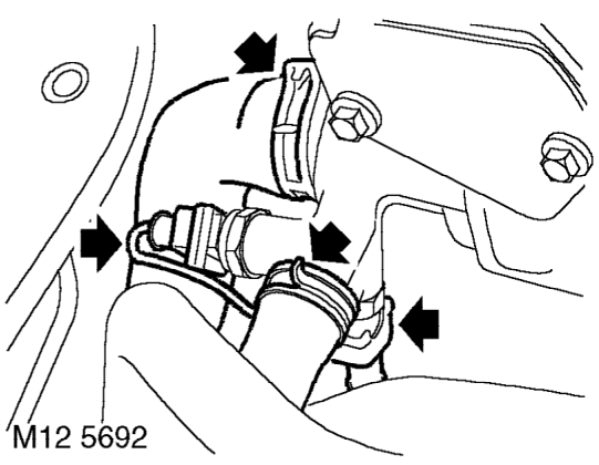 Release exhaust manifold from cylinder head. Position manifold aside, remove and discard g