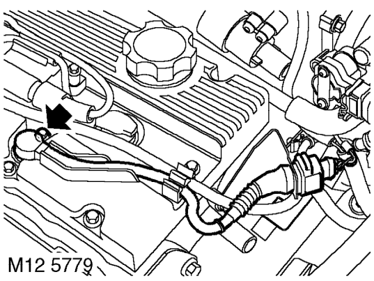 Gasket - camshaft cover – Release coil harness from support bracket and position aside.