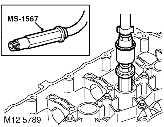 Valve stem oil seal – Using a 16 mm spark plug socket, remove 4 spark plugs.
