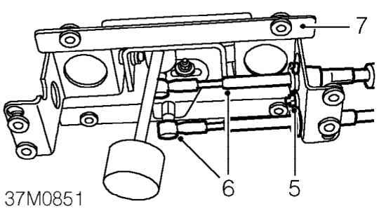 Gear lever – Remove 4 nuts and 3 bolts securing lever assembly to tunnel.
