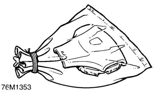 Press both operating buttons of deployment tool SMD 4082/1 to deploy the airbag module.