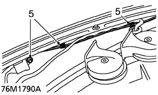 Feed bonnet release cable through hole.