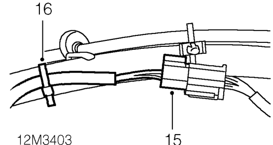 Release harness clip from rear of air cleaner bracket.