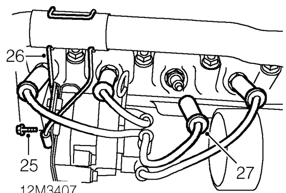 Loosen top hose, expansion hose and heater hose clips and disconnect hoses from thermostat