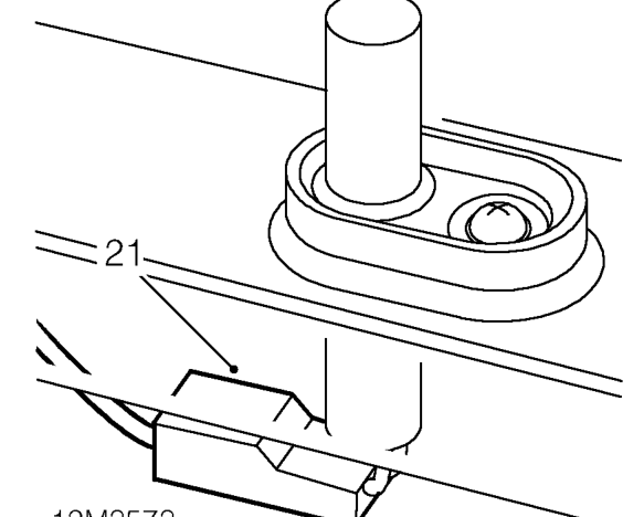 Remove bolt securing earth leads to body.