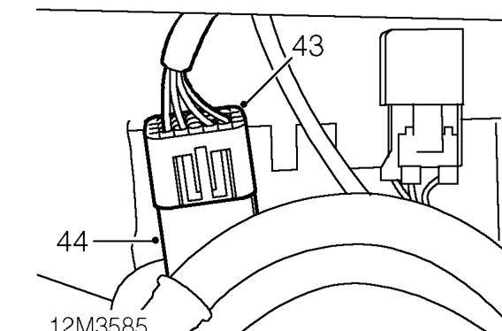 Disconnect multiplug from evaporative emission canister purge valve.
