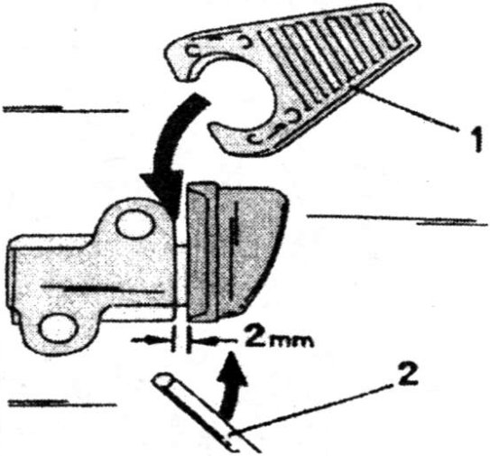 A Renold chain tensioner with plastic lock washer and steel wire