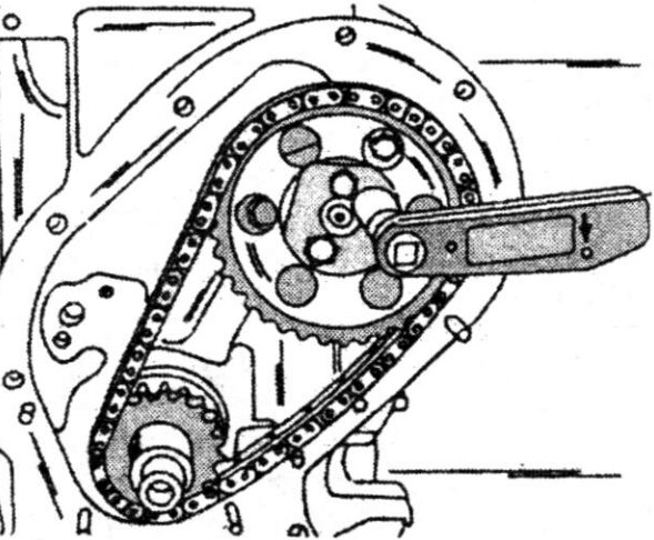 The camshaft sprocket secured with three locked screws to the camshaft.