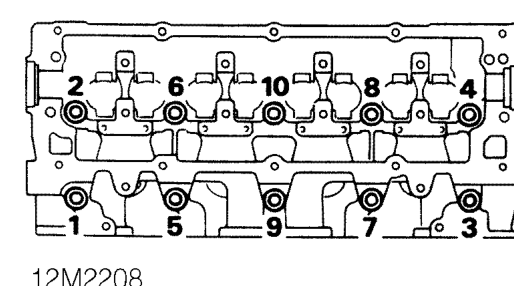 Release front pipe from manifold, remove and discard gasket.