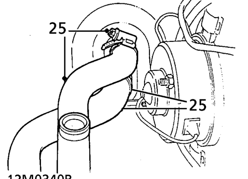 Loosen clip and disconnect top hose from cylinder head.
