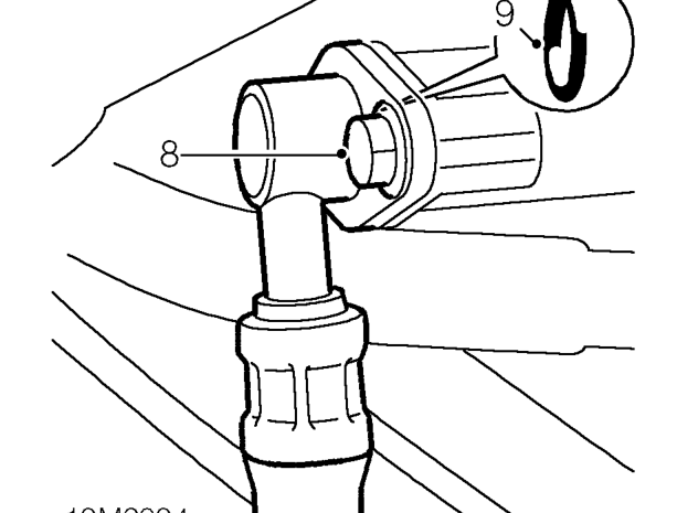 Position an absorbent cloth around fuel feed connection.