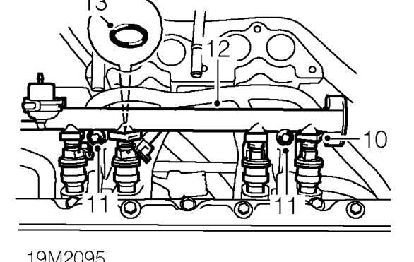 Release fuel feed pipe from fuel rail and discard ’O’ ring.