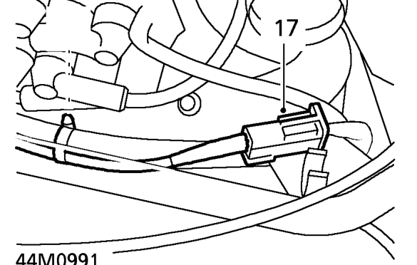 Loosen clip,and disconnect top hose from cylinder head.