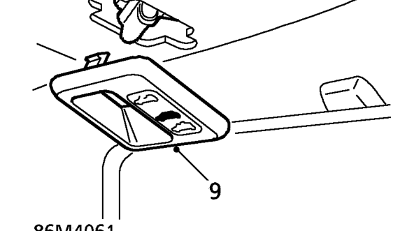 Aerial – Remove 2 trim studs securing headlining to roof.