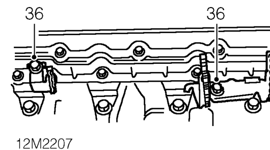 Remove bolt securing inlet manifold to support bracket.
