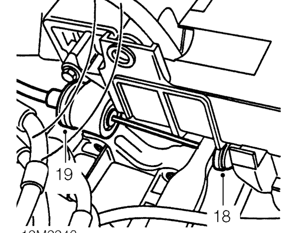 Loosen clip and disconnect heater hose from coolant outlet elbow, position hose aside.