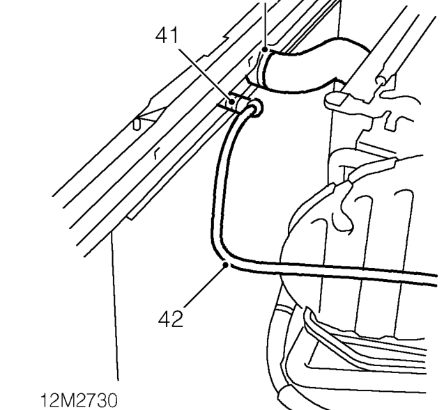 Remove radiator cooling fan. See COOLING SYSTEM - ’L’ SERIES, Repairs.