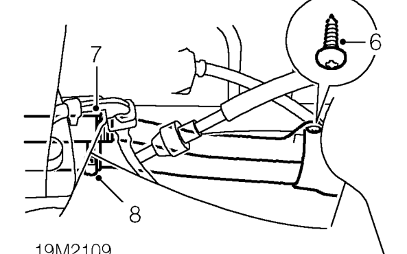 Fuel tank - ’l’ series – Release handbrake cable from ’H’ frame mounting.