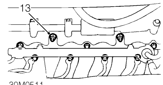 Remove bolt securing support stay to inlet manifold.