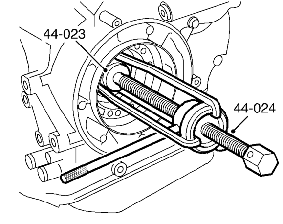 Using a small screwdriver, lever out seal from primary bearing.