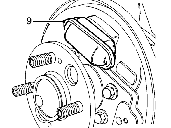 Manoeuvre shoe assembly around wheel cylinder and remove.