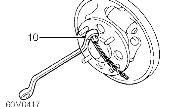 Disconnect both handbrake cables from brake levers.