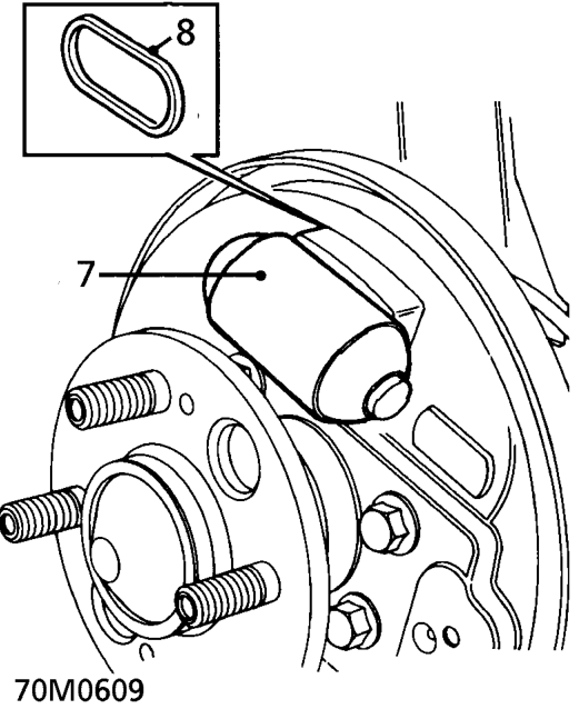 Rear wheel brake cylinder – Remove 2 bolts securing wheel cylinder to backplate.