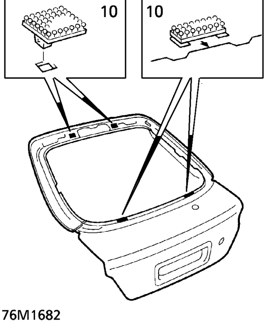 Fit sub-moulding to edge of tailgate.