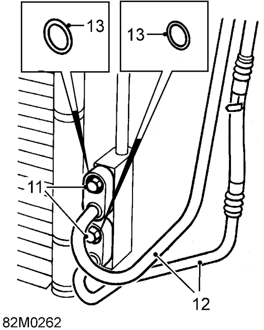 Manoeuvre condenser from condenser fan housing and remove from vehicle.