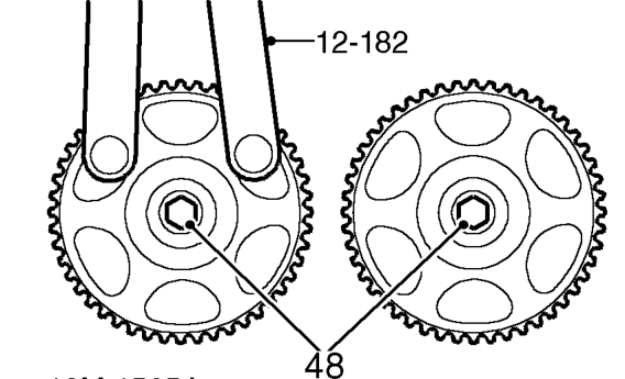 Fit 2 camshaft gears to their respective camshafts.