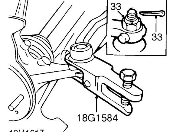 Release lock washer and remove bolt securing selector cable to gearbox.
