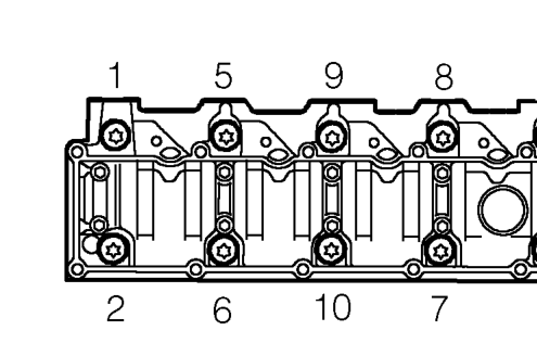 Release gasket from camshaft cover and discard.