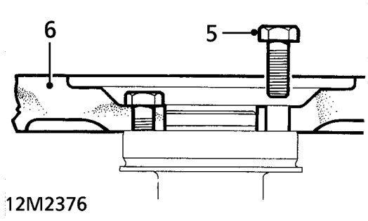 Flywheel – Fit tool 18G 1641 to crankshaft pulley, using 2 pulley bolts.