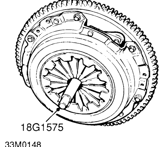 Position drive plate to flywheel with ’FLYWHEEL SIDE’ marking towards flywheel.