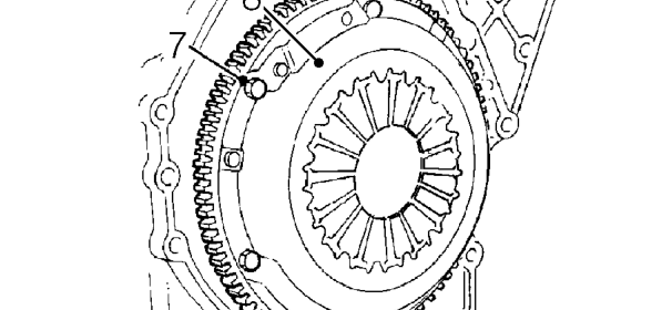 Using a socket and extension bar on crankshaft pulley bolt, rotate crankshaft until flywhe