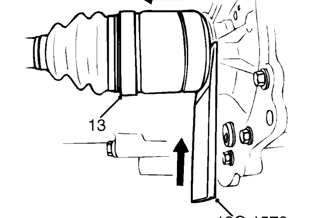 Remove nut from lower ball joint and release lower suspension arm from front hub.