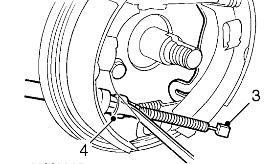 Rear trailing arm and stub axle - drum brake without abs – Remove bolt securing handbrake cable clip to trailing arm.