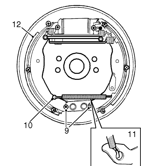 Remove 2 clips and 2 pins retaining brake shoes.