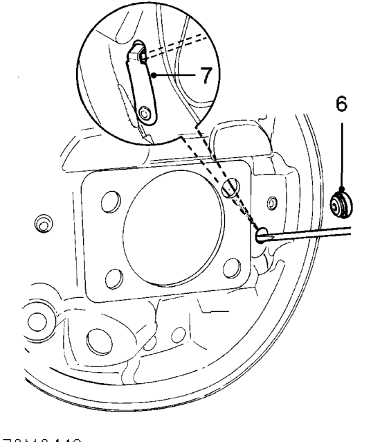 Rear brake drum – Screw 2 screws into drum, tighten equally to ease drum from hub.