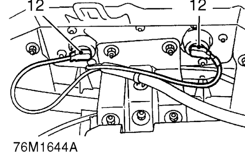 Disconnect multiplug from control and diagnostic unit.