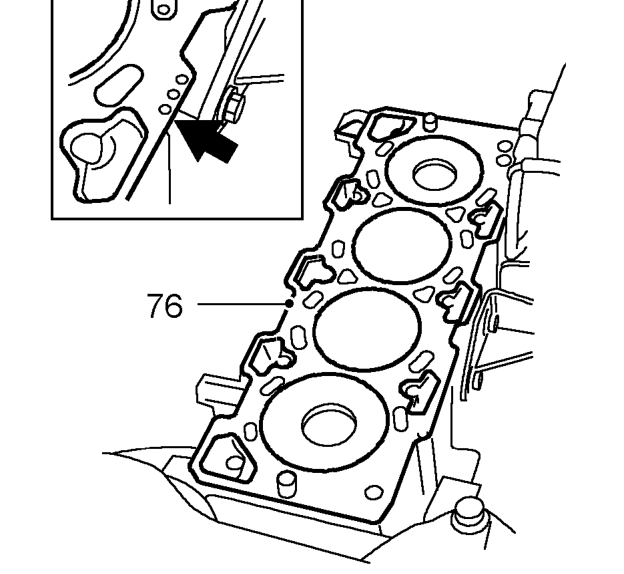 Remove cylinder head assembly and place on wooden blocks or stands.