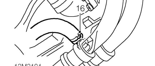 Remove 2 bolts securing oil cooler pipe clips to sump.
