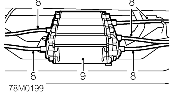 Remove 4 bolts securing motor assembly to seat.