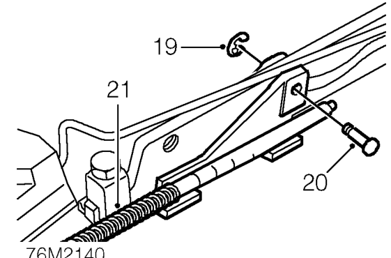 Remove forward tensioner spring from culisse.