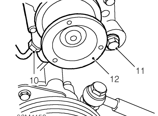 Warning: support on safety stands. – Remove bolt securing alternator to top mounting bracket.
