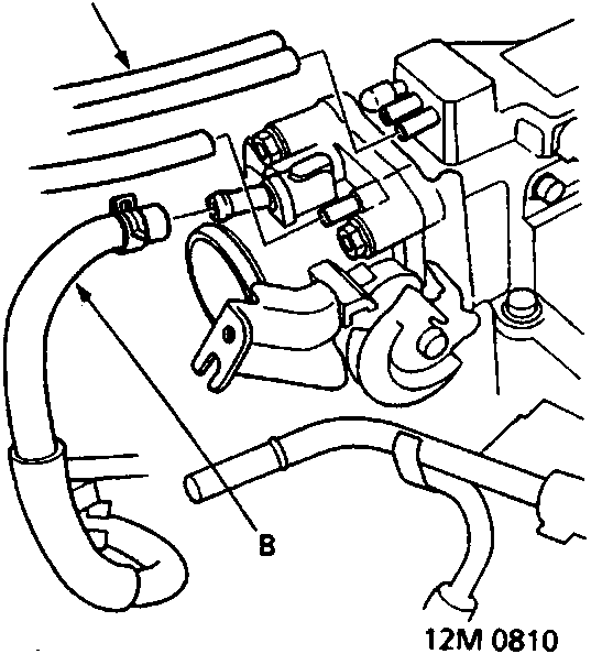 Diagram showing emission control vacuum tubes and evaporator control canister hose connections on the intake manifold