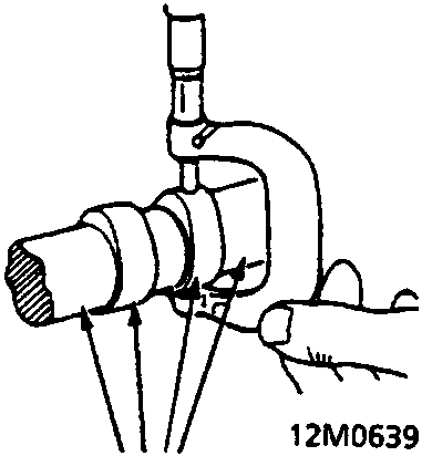 Diagram showing cam lobe height measurement with a micrometer