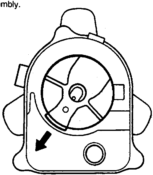Diagram of a distributor showing the rotor and housing with an arrow indicating direction