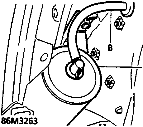 Diagram showing vacuum tank and hose in wheel arch area